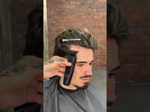Cutting Ollie’s hair so he looks like he’s a football player