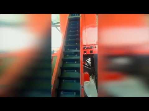 Agricon Pellet, Pelleting or Pelletizing Machine - Bucket elevator taking pellets into a cooler
