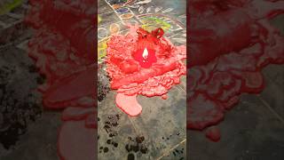 A Durga Puja candle, softly lit,Flame danced, prayers flit. In red wax glow, strength shine.