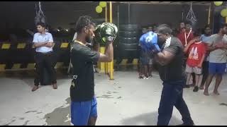 Boxing defensive techniques -blocking punches in combination with good footwork.