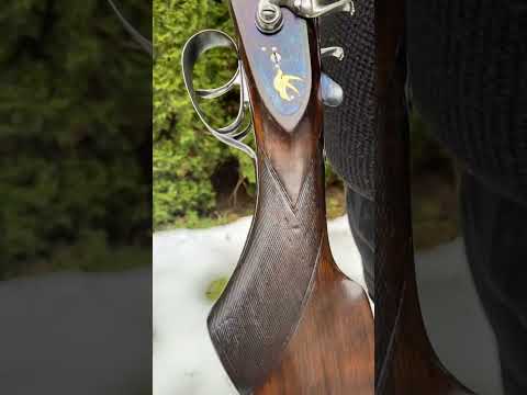 12ga double barrel shotgun with gold inlay