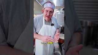 Why add white wine to tomato soup?