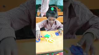 my government school student learning words by TLM 😀