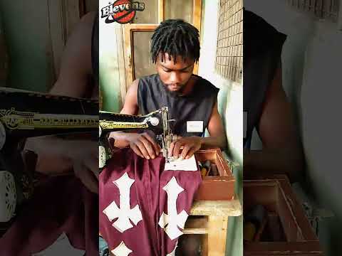Cross symbol design on jeans