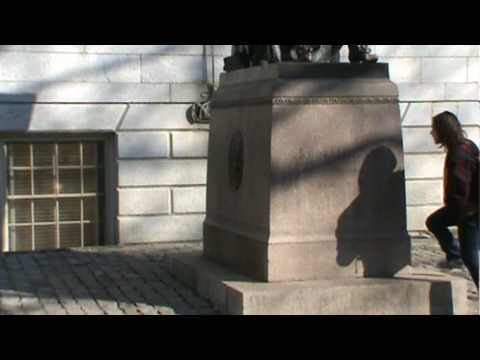 Statue Of John Harvard at Harvard University.