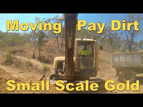 Moving pay dirt. Small Scale Gold Mining.