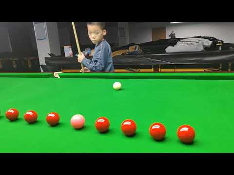 Training my 8 year old student Guan Hanlin at Yushan International Billiards Academy China