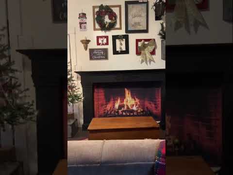 Transform this boring fireplace into a cozy festive Christmas living room! https://amzn.to/3R4CXon
