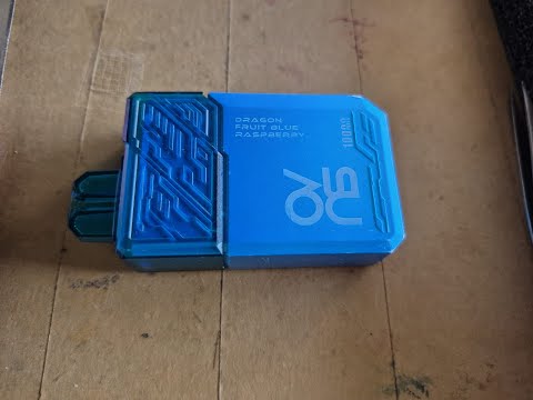 What is inside? Let's discover "DRAGON " Fruit blue raspberry 10000 puffed vape and refill it.