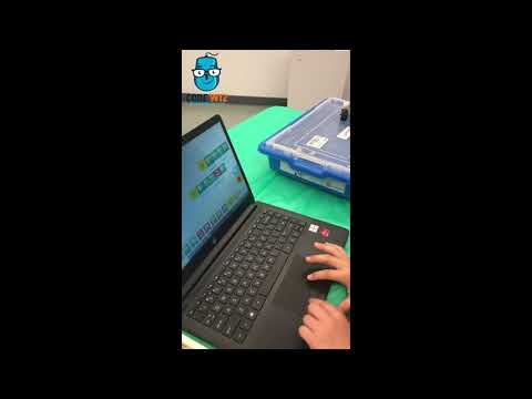 Code Wiz Arlington student explaining robot