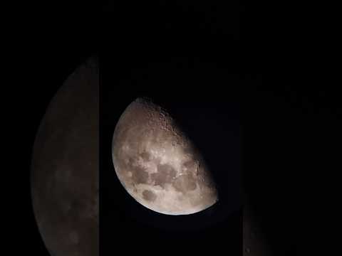 Cretors of first Quarter waxing moon through 130/650 Newtonian telescope and 10 mm eye p