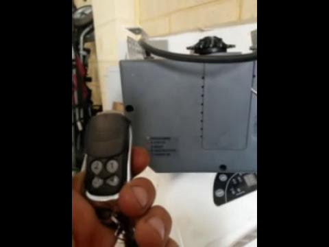 Dominator garage door remote control programming