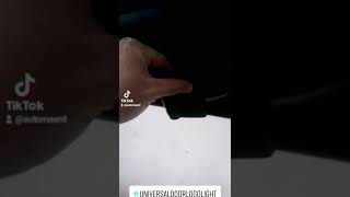 Car Door Logo Lights Installed On a Toyota Hilux.