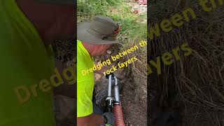 Gold dredging between rock layers #goldmining