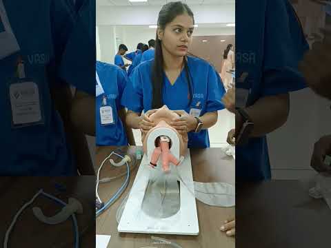 Doing jaw thrust and tounge maneuver , sniffing position(head tilt and chin lift)