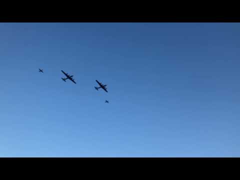 B-29s and P-51s flying formation at EAA Airventure 2025