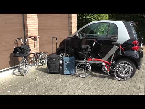 smart car trunk boot cargo size - will it fit 2 bicycles, 2 trolleys and 2 touring bags ?