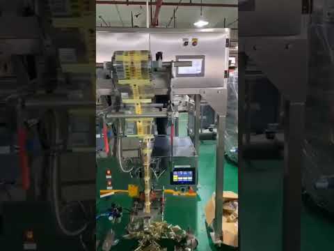 Electronic scale packaging machine, automatic tea packaging machine, nuts packaging machine