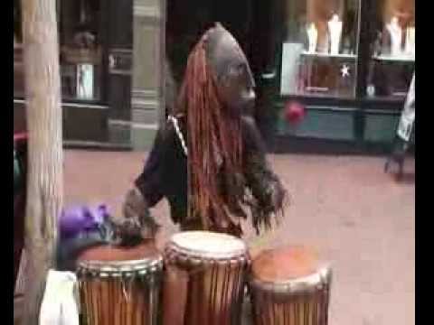 African drummer jams with a stranger