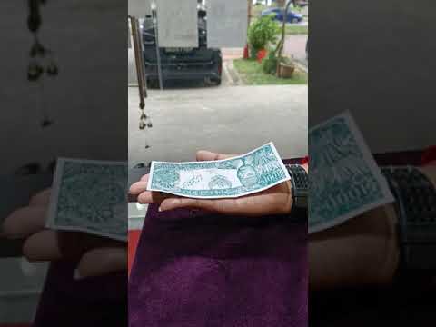 Our Wealth Fetching  Ibu Duit Talisman folding by itself when placed on the Palm.