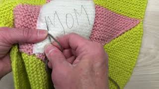 Learn to use stick-and-stitch interfacing to embellish your blanket.  