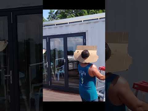 Here's how I keep the water away from my container home doorways! 🌧️🚪 #staydry #homehacks
