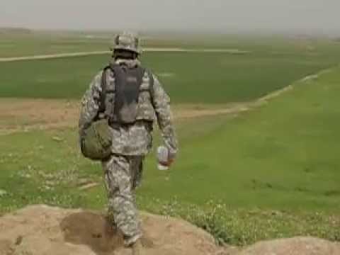 US Army Infantry giving water to Iraqi Kids