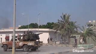 Libya conflict: rebels fight their way into Col Gaddafi's compound