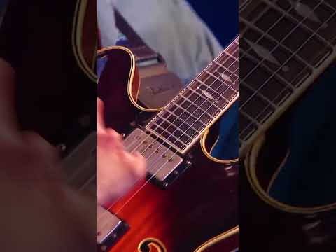 A Guitarist with the Hand of God