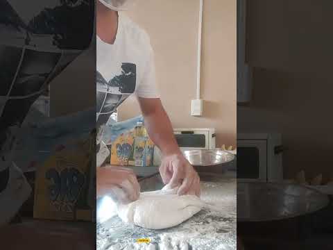 Kneading of dough and also Stretching the dough to make it round.